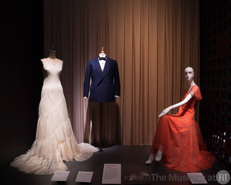 Exhibitionism_15 Left to right 93.71.4 (dress), 2000.14.2 (jacket), 69.159.2 (orange dress)