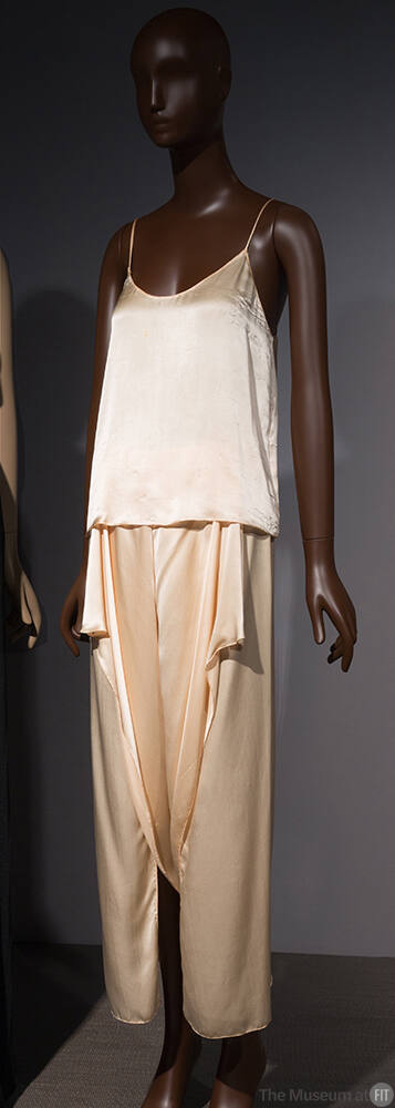 Ivory hip length camisole, with scoop  neck and seamless wide leg pants with draped corners