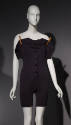 union suit on a clothes line, in black linen knit with clothespins