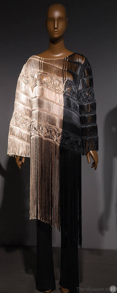 Long sleeve top of ombre taupe, brown and black knee length fringe with diagonal seaming dresse…