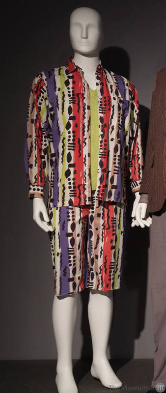 Button up shirt and matching knee length shorts in white printed stripes and graffiti pattern o…