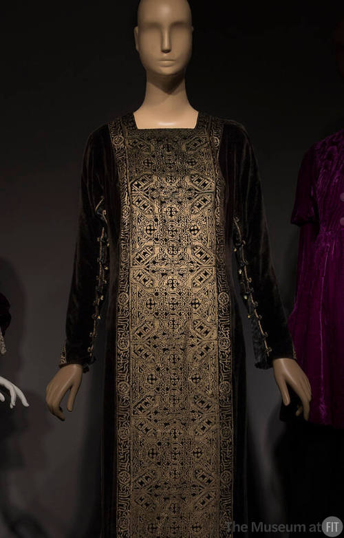 Black velvet long sleeve square neck dress with gold metallic print front, gold braid at sleeve…