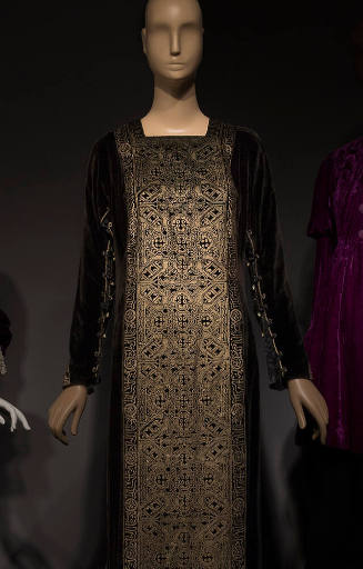 Black velvet long sleeve square neck dress with gold metallic print front, gold braid at sleeve…