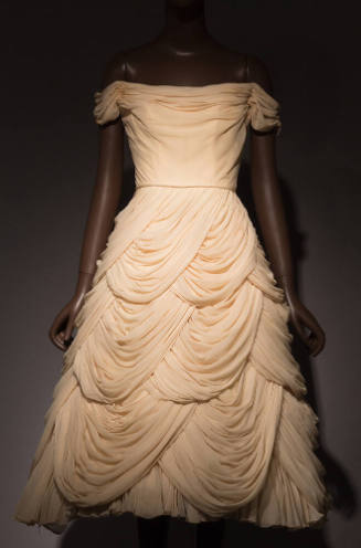 Ivory strapless cocktail dress with draped cowl neck, off the shoulder sleeves and multiple tie…