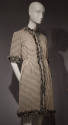Black and white woven dress with self fringe trim around neckline and sleeve cuff
