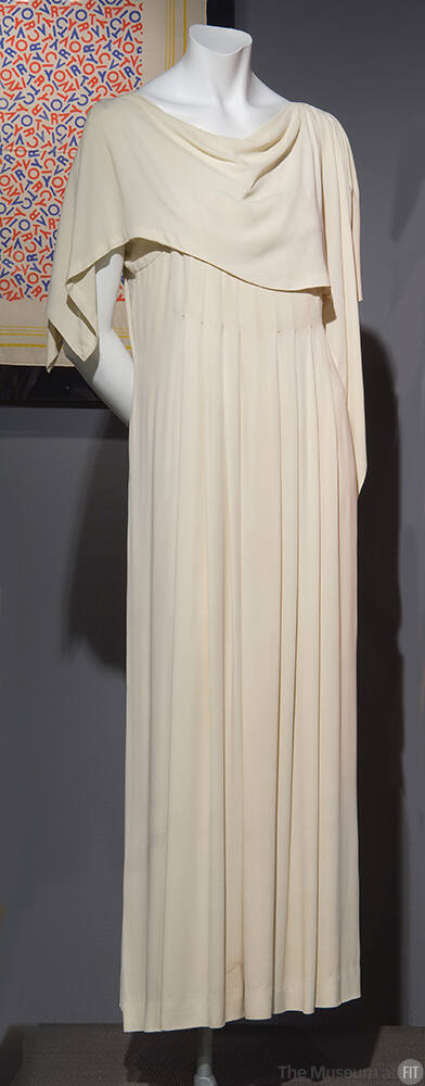 Cream crepe floor length evening dress and capelet